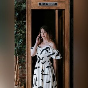 Cold-Shoulder Smocked Midi Dress in White with Black Print